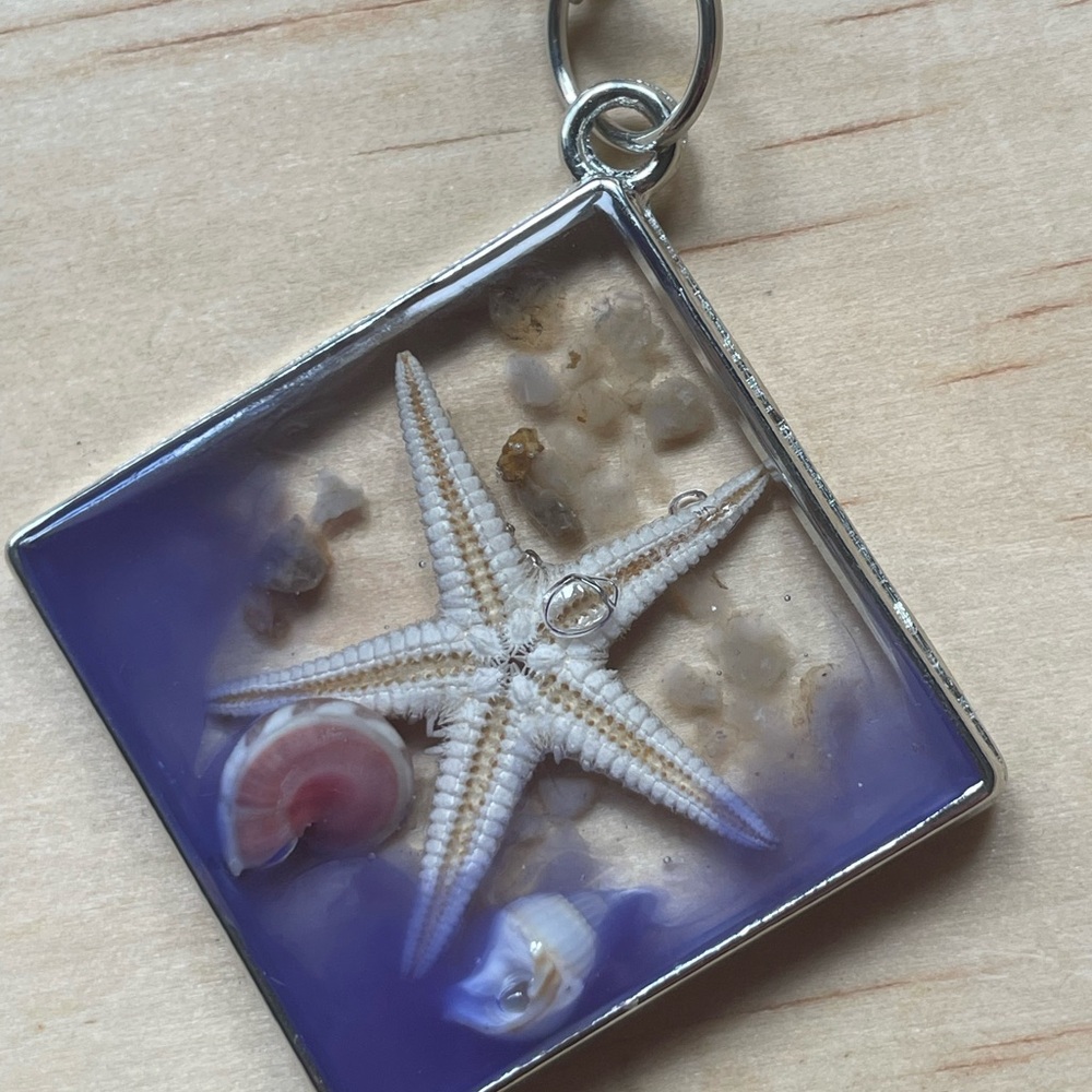 Starfish and Shell Pendant with Purple Background